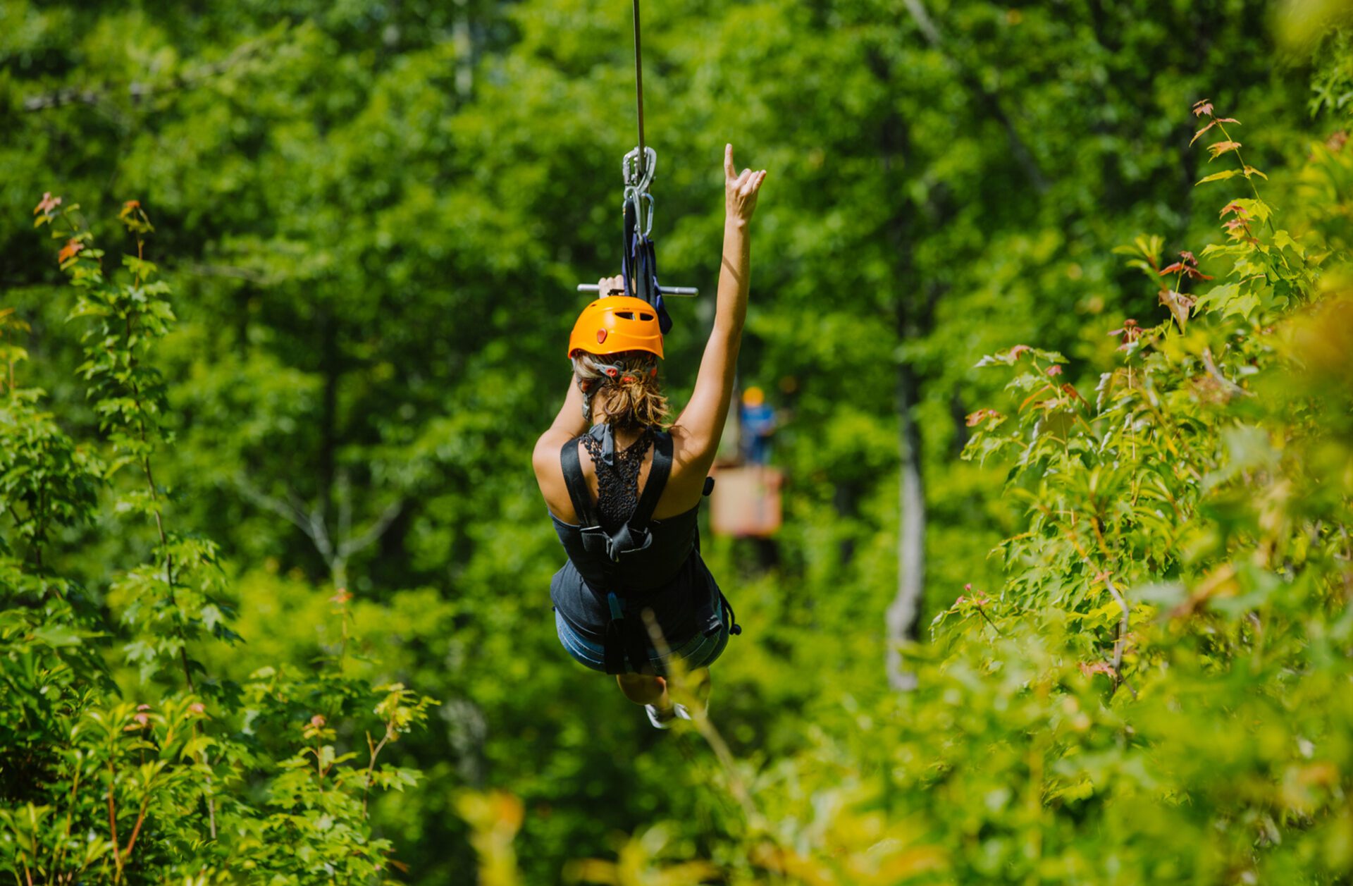 This image portrays 4 Ways to Guarantee You Have the Best Time Ziplining in the Smoky Mountains by CLIMB Works.