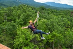 girl ziplining in the smokies