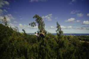 two men ziplining in oahu