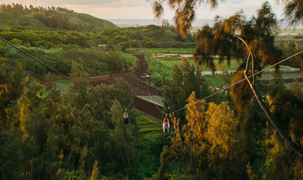 two people ziplining in oahu