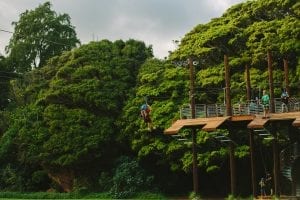 girl ziplining in oahu