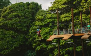 girl ziplining in Oahu