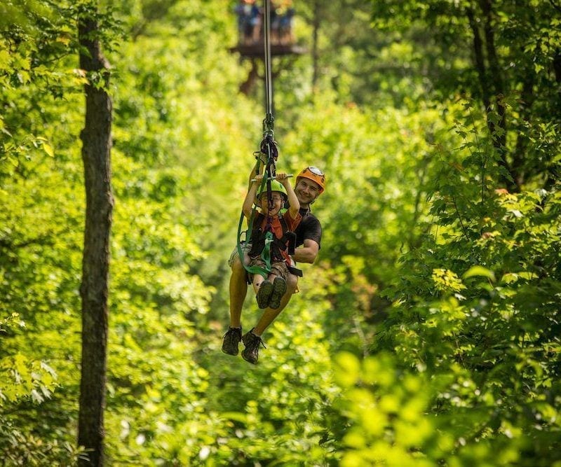 dad and son ziplining in gatlinburg