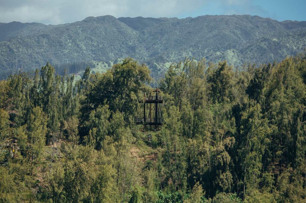 A CLIMB Works zip line platform backs up to stunning mountain ridges in on the North Shore