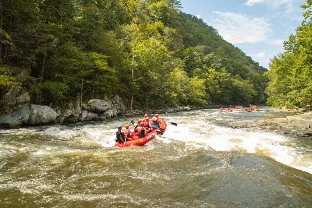 A Smoky Mountain Outdoors' raft navigates through rapids