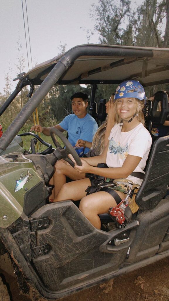 Smiling driver and guests enjoy a UTV adventure at CLIMB Works